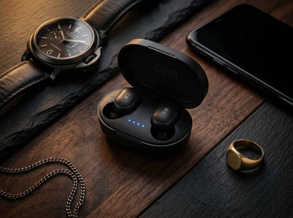 CTRL8 A6S wireless earbuds in sleek black charging case placed on a wooden surface alongside accessories.