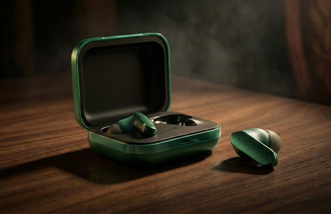 CTRL8 Buds Air 7 Pro true wireless earbuds with 48-hour playtime in green variant on a wooden surface