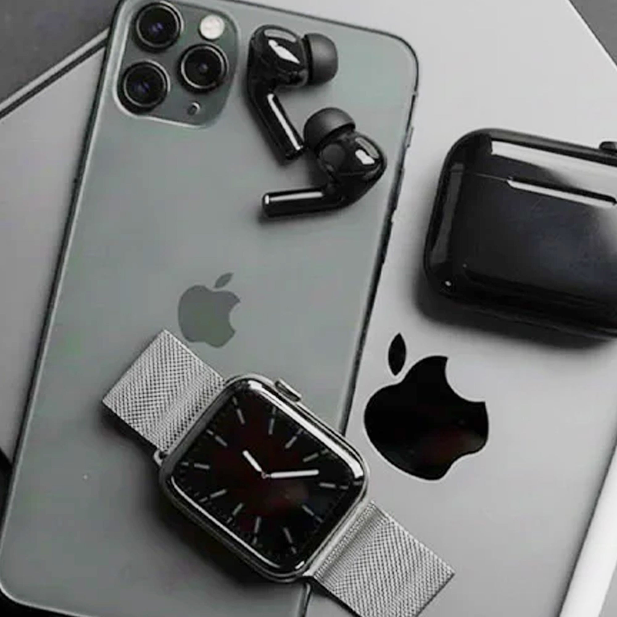 CTRL8 Wireless Airpods Pro 2 displayed with tech gadgets, emphasizing sleek design and compatibility